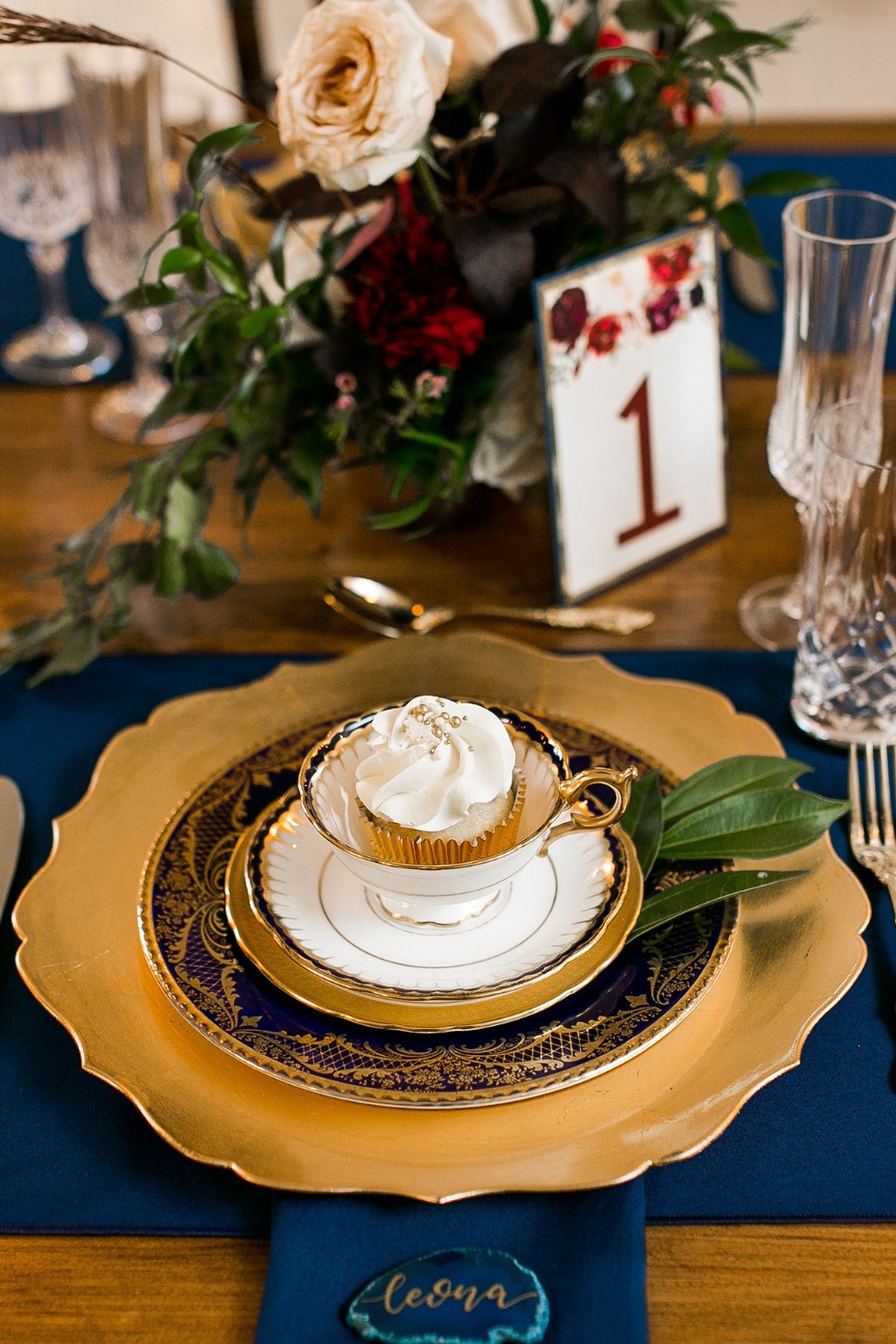 fantasy wedding place setting in blue and gold