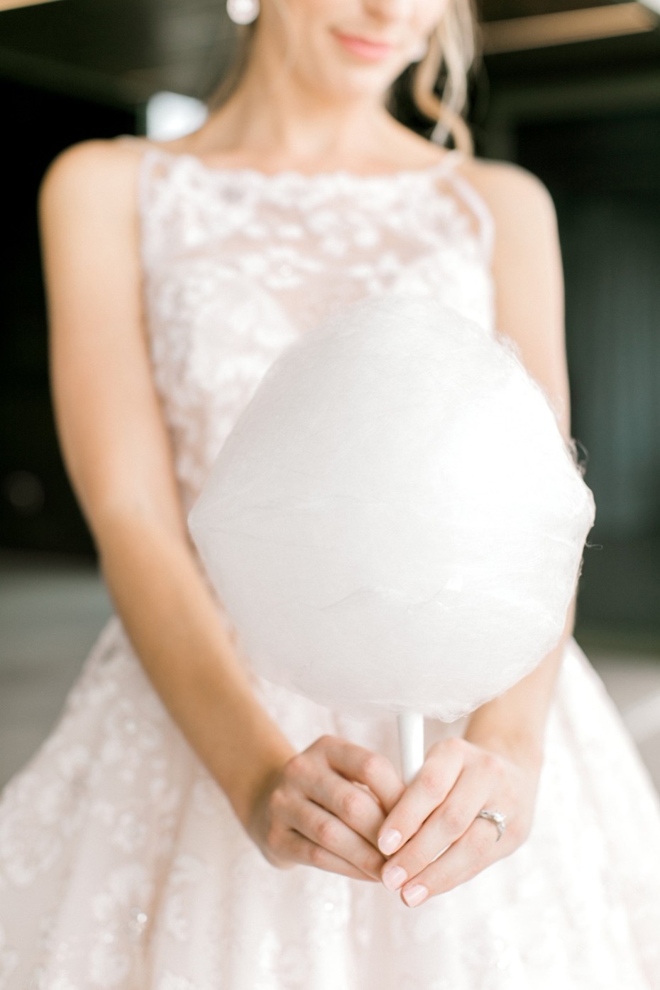 Bride holding cotton candy