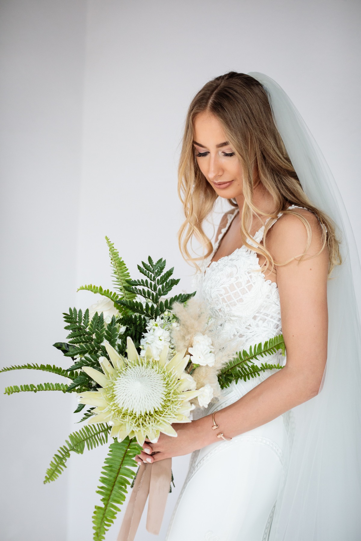 Giant white protea wedding bouquet