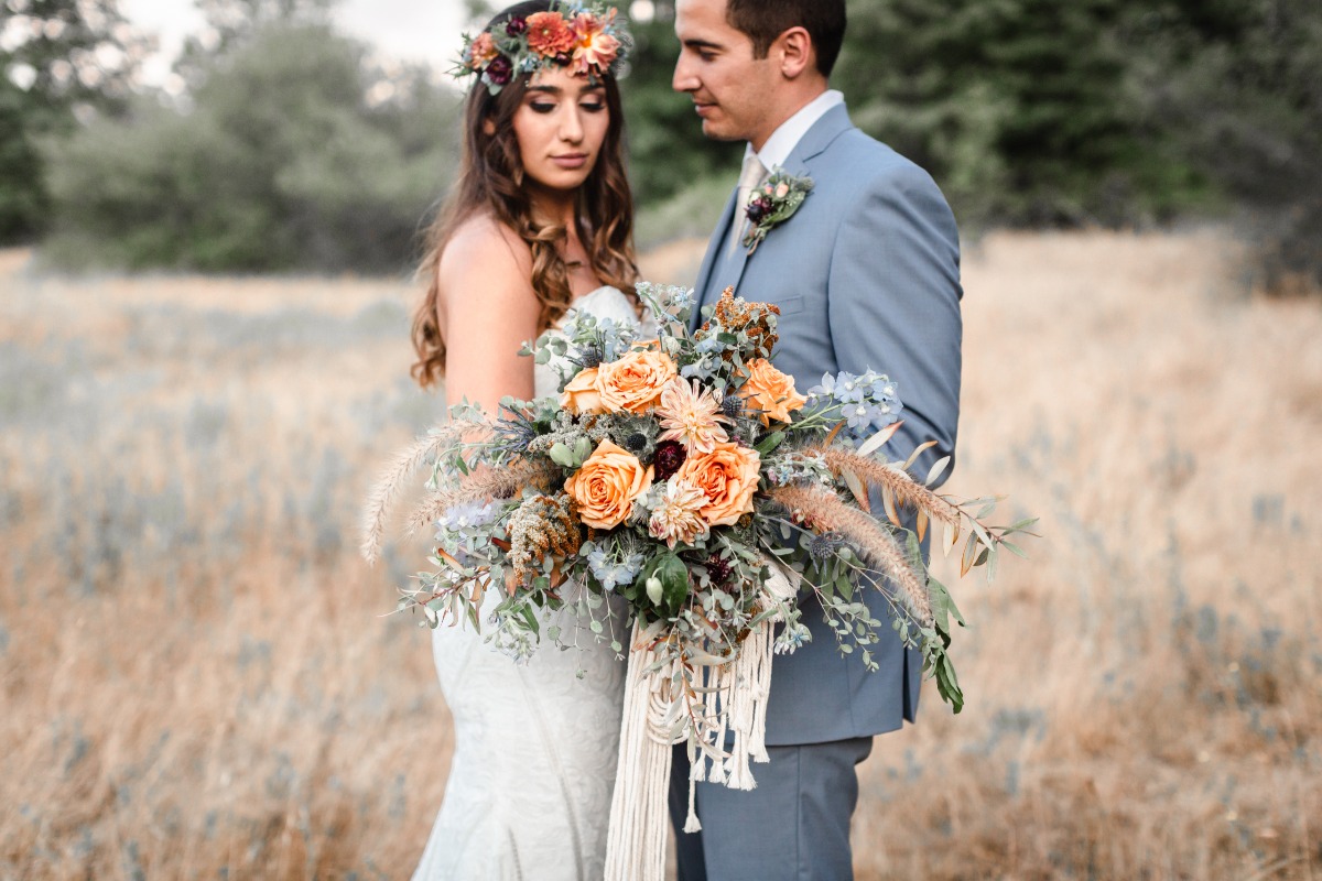orange and blue bouquet with macrame wrap