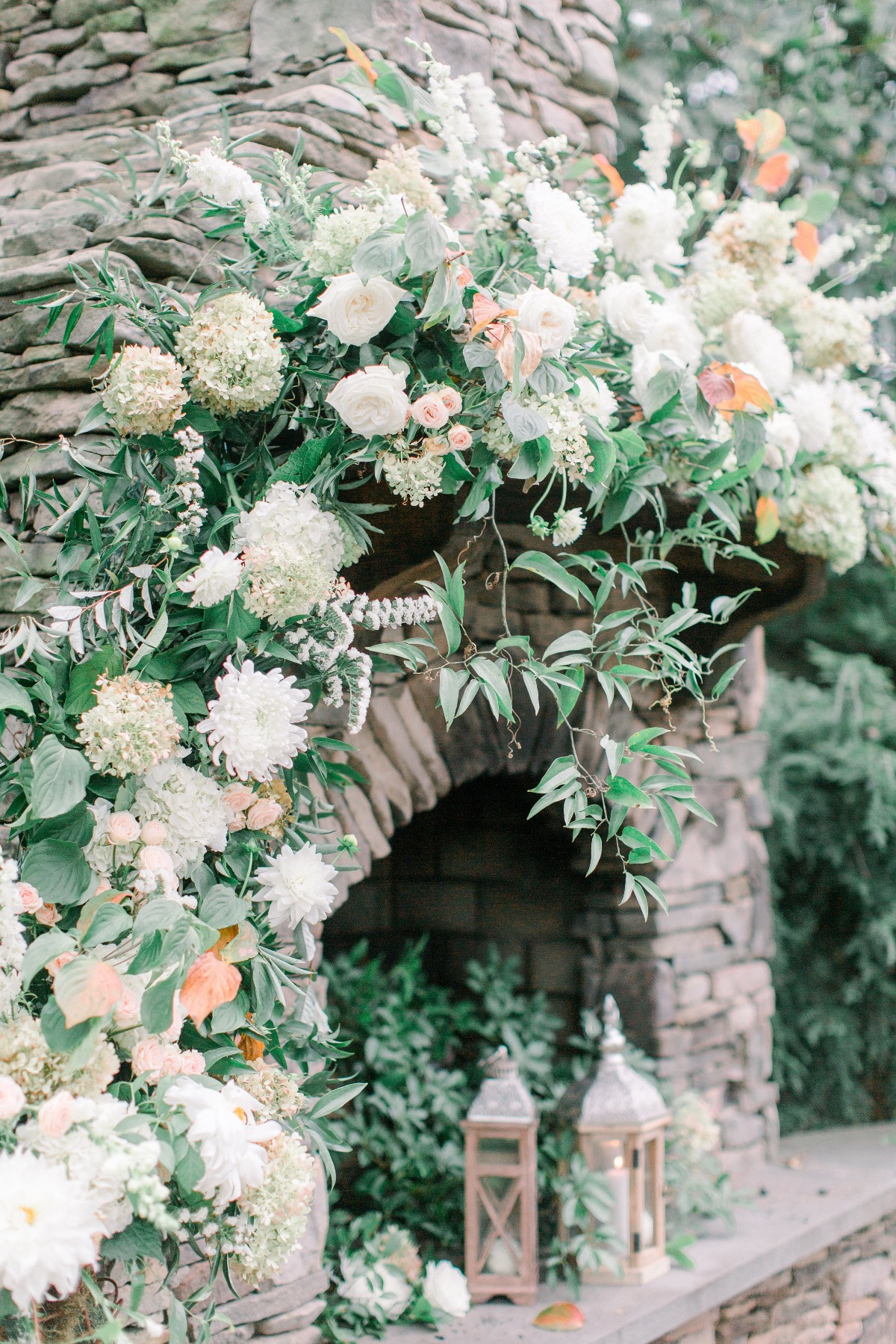 floral accented wedding hearth backdrop
