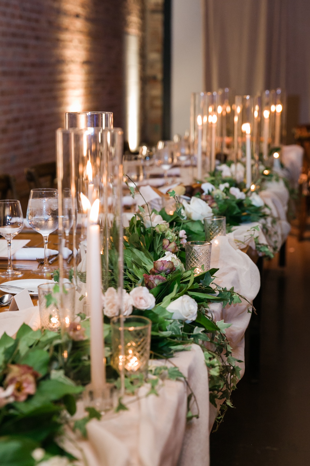 candle lit wedding party table