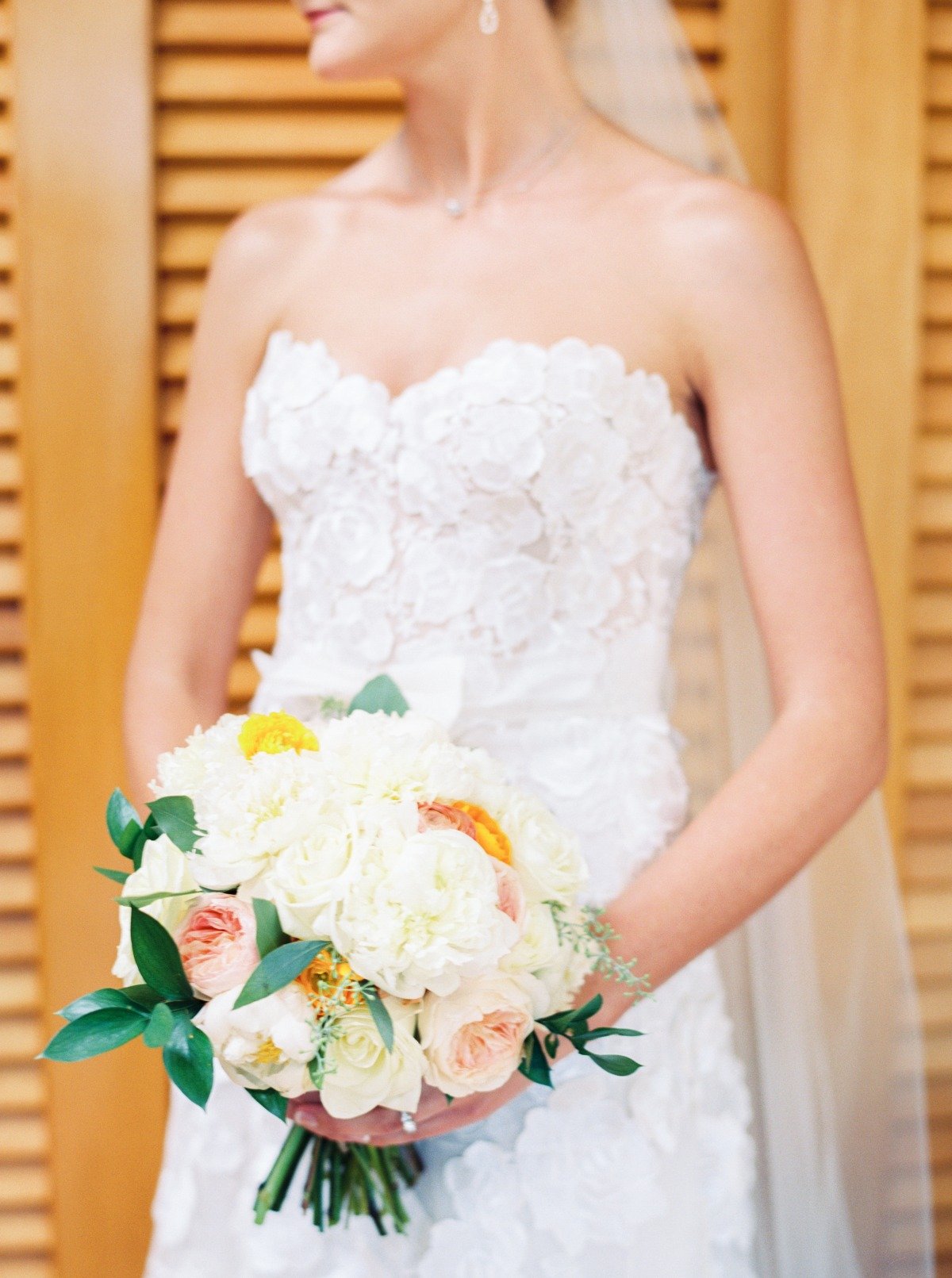white yellow and peach wedding bouquet