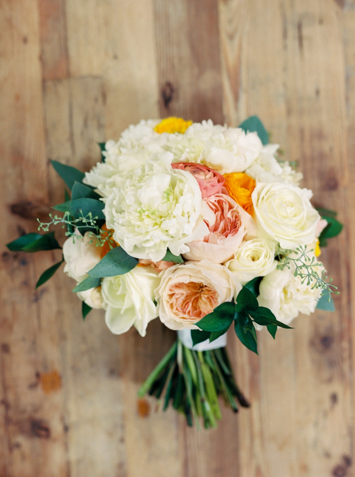 white peach and orange wedding bouquet