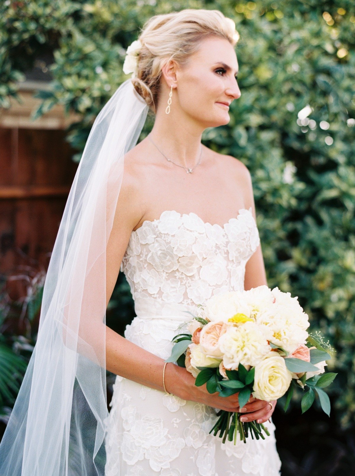 floral applique wedding dress and elegant wedding updo