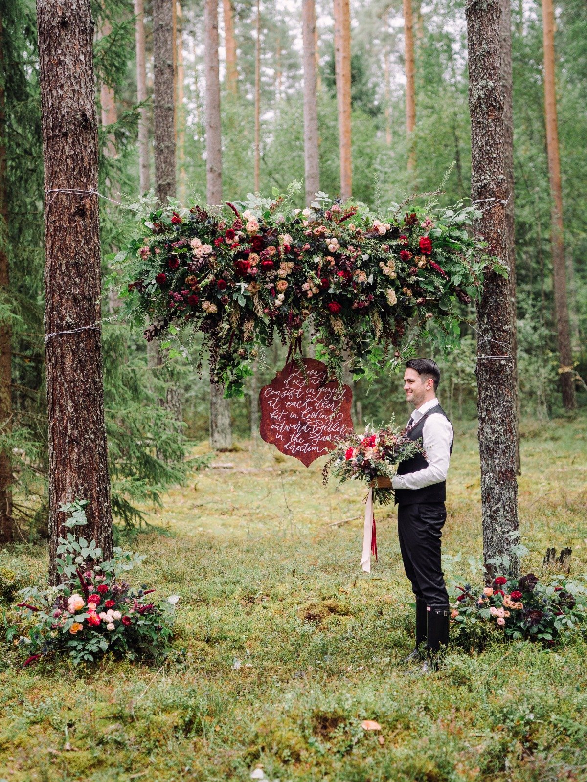 floating floral wedding ceremony backdrop