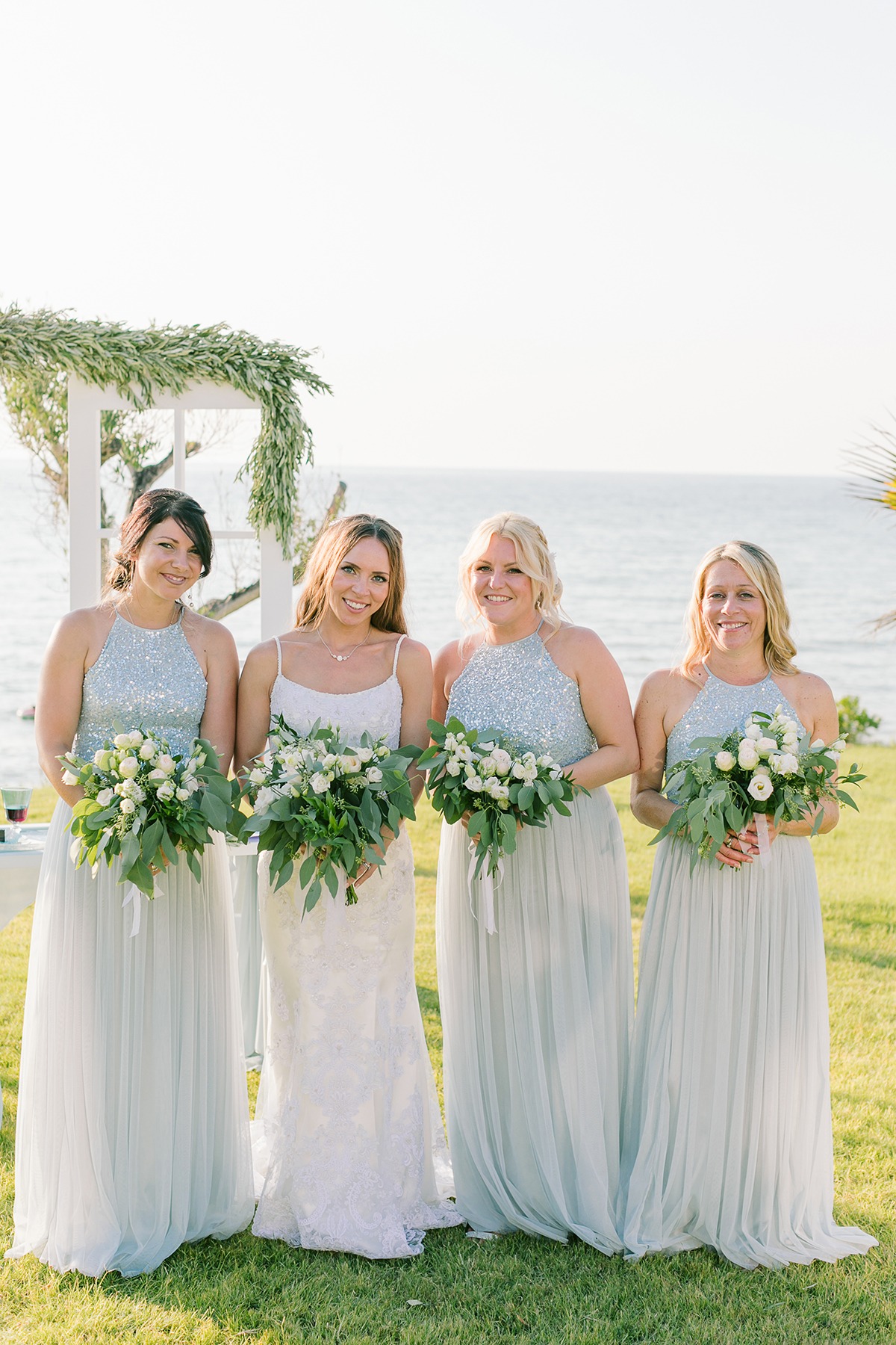 Bridesmaids in silver sparkly dresses