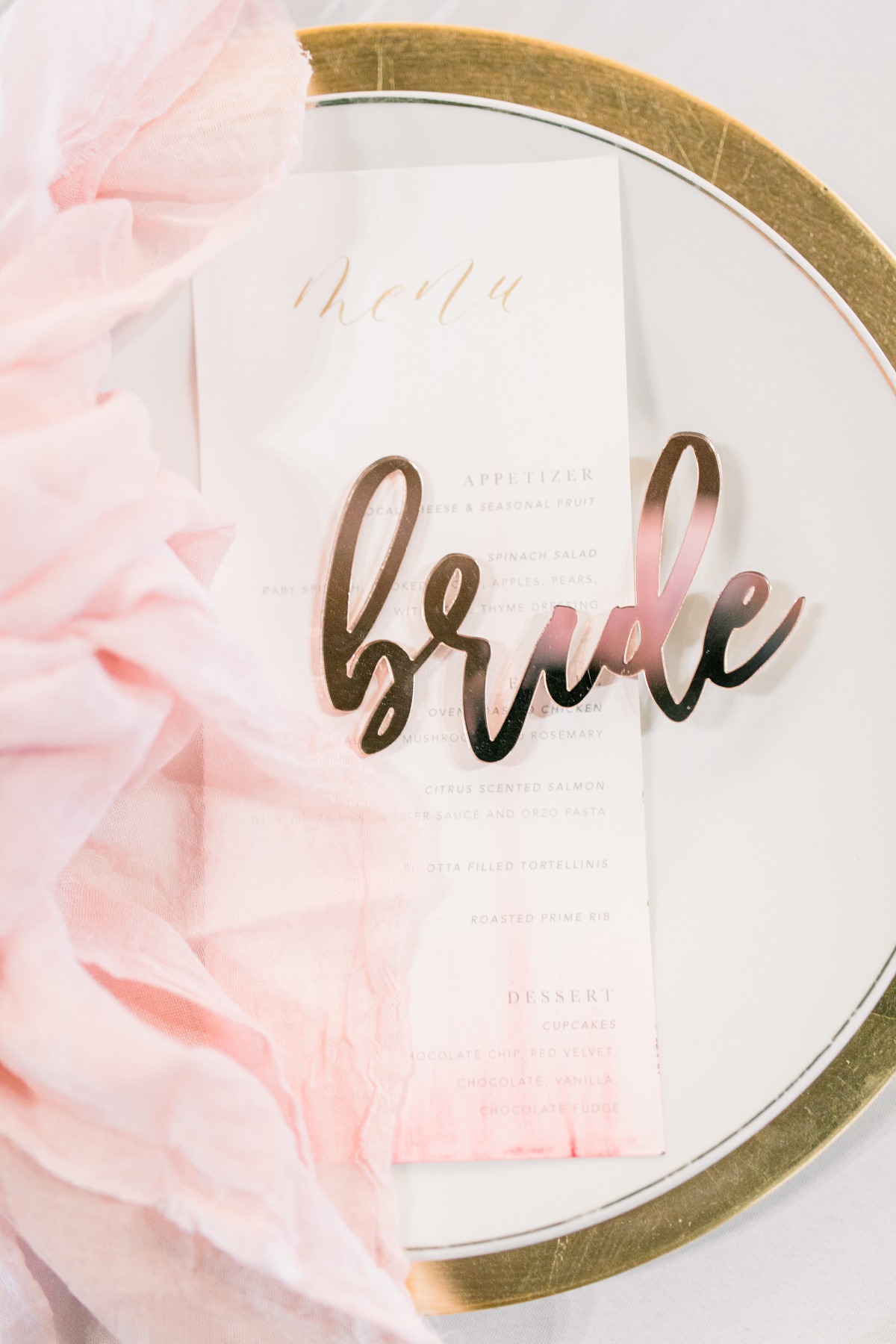 Elegant wedding place setting with bride decoration and menu