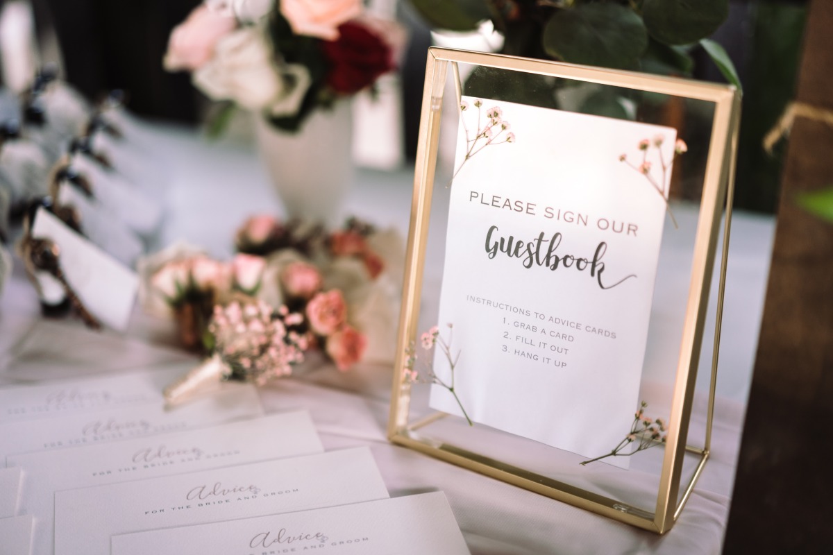 Wedding guestbook table with sign and advice cards