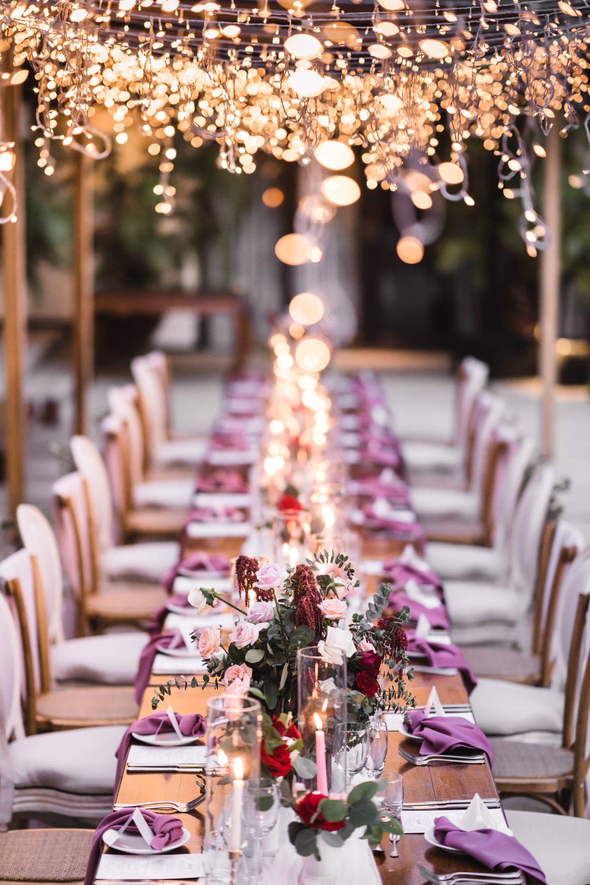 romantic purple wedding table decor with fairylights