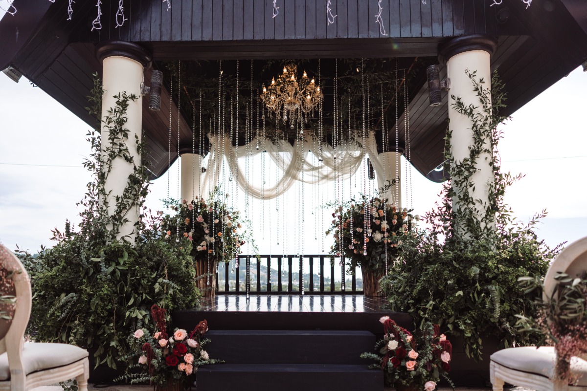 Elegantly decorated wedding altar with floral accents