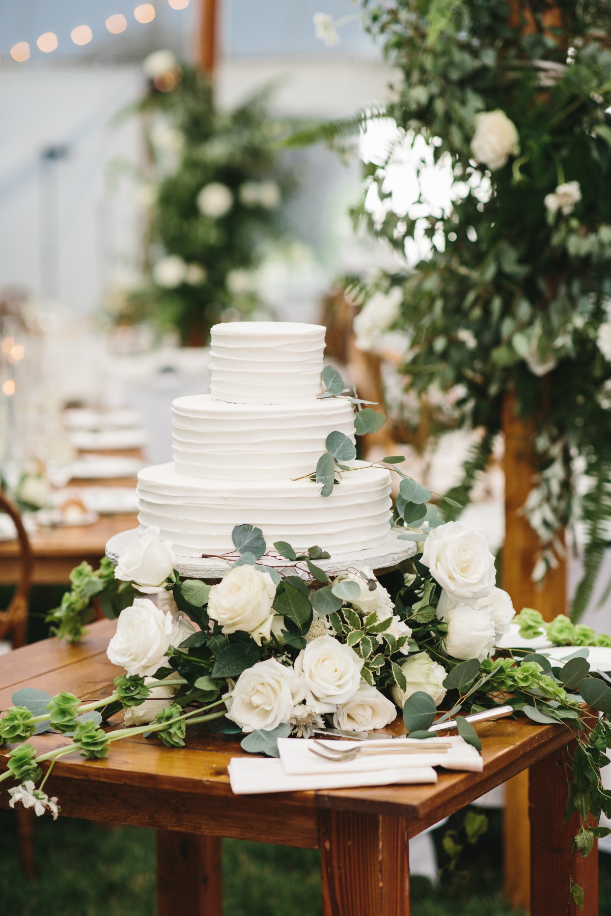 simple eucalyptus accented wedding cake