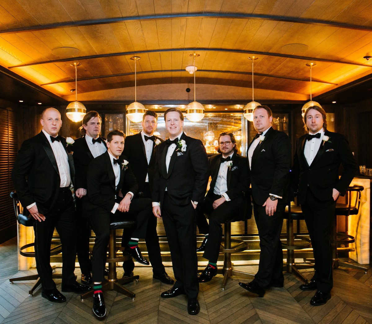groom and groomsmen in classic tuxedos