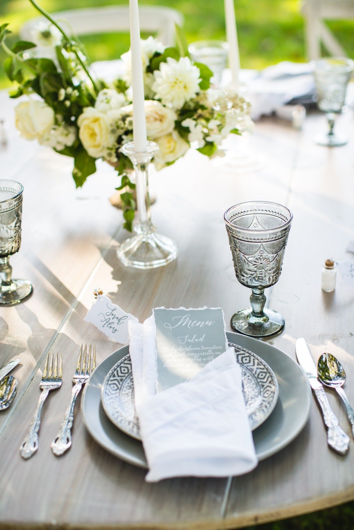 modern white and grey wedding place setting