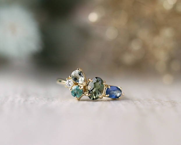 Natural four stone sage green diamond engagement ring