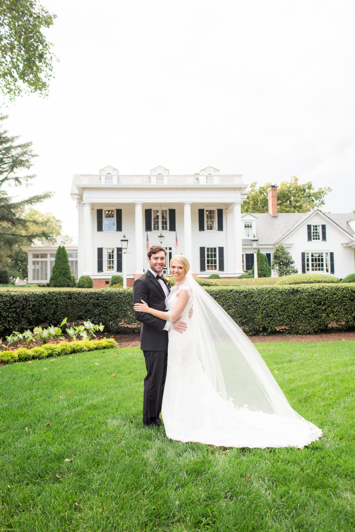 Bride and groom portrait at historic plantation house