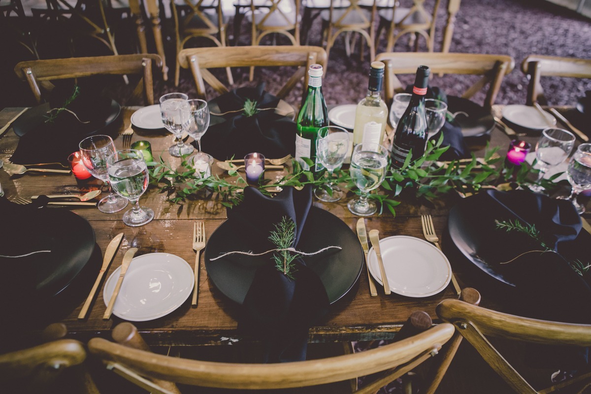 dramatic black and gold wedding place setting