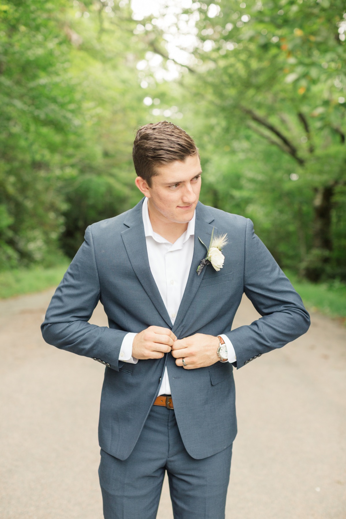 groom in dusty blue suit