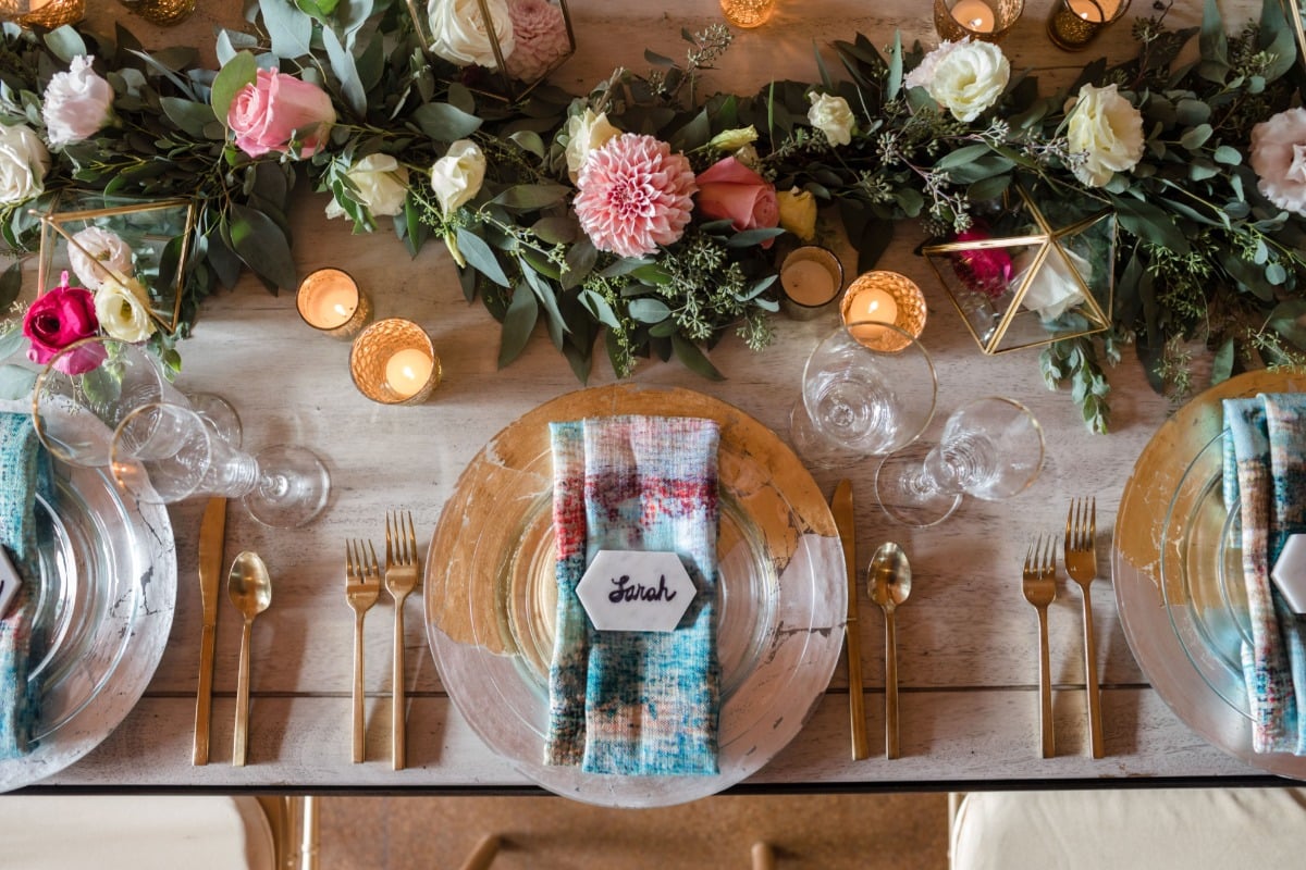 fun and funky gold and silver and blue and pink wedding table idea