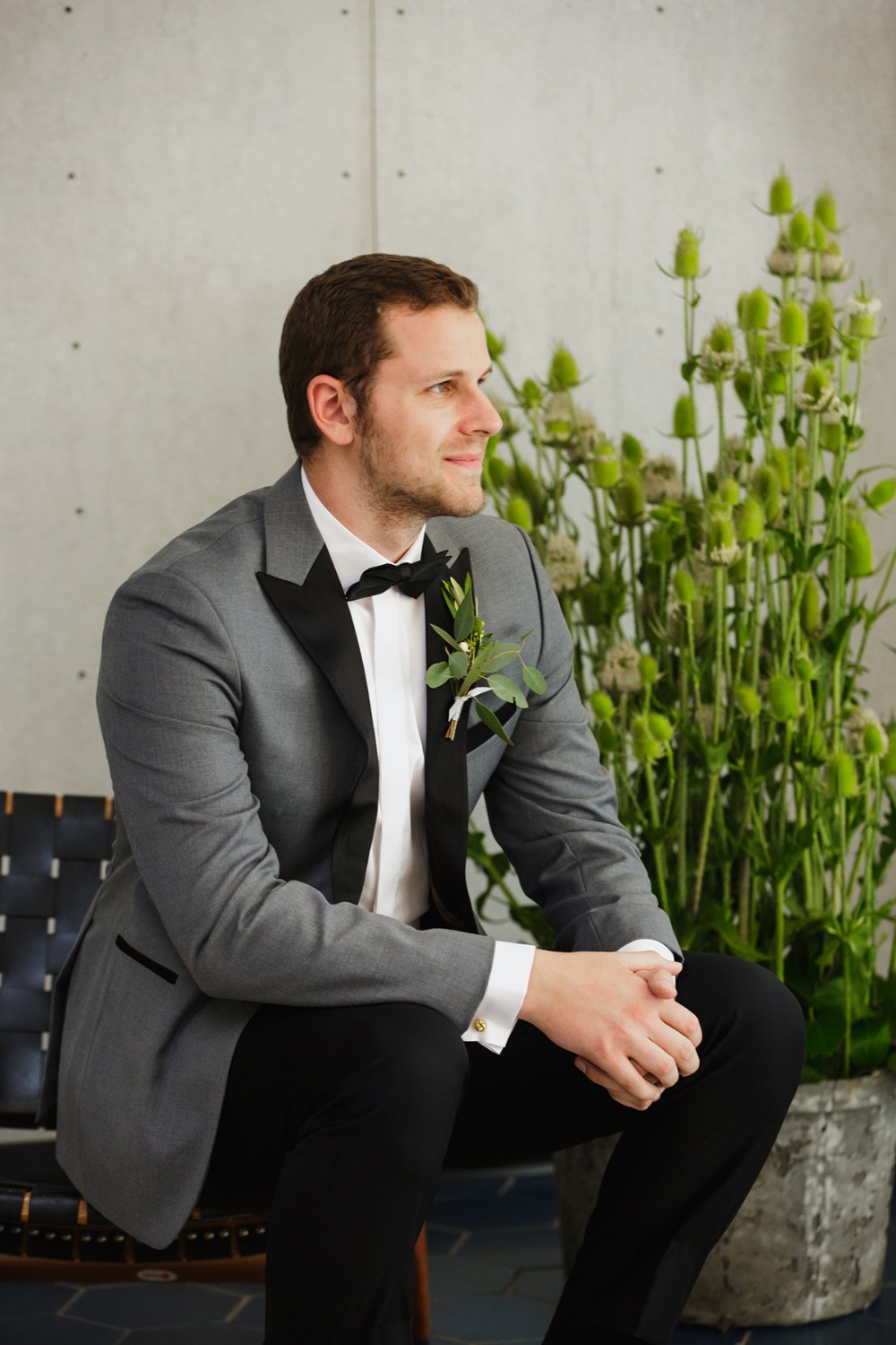 groom in grey and black suit jacket