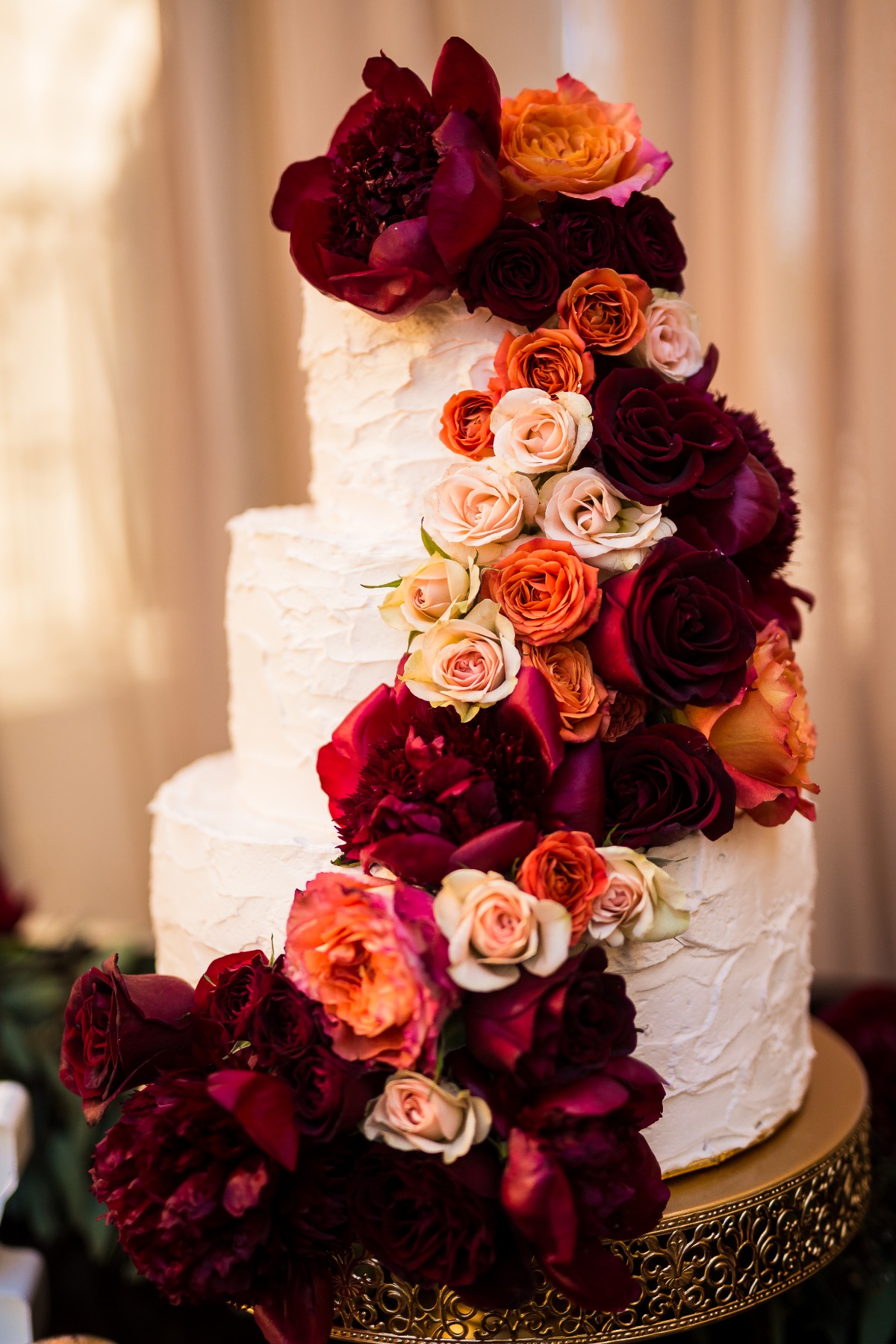 Wedding cake covered in roses