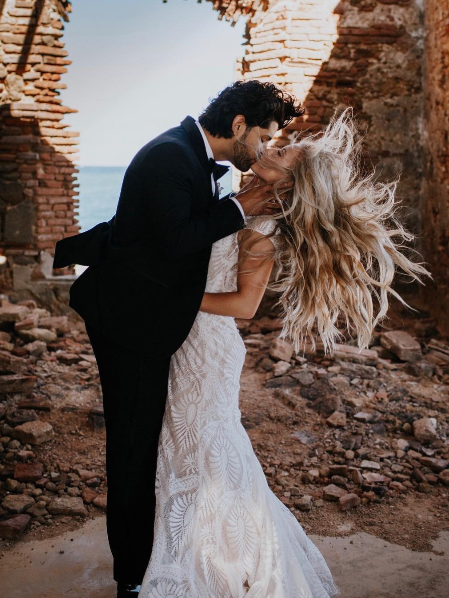 20 of the Most Epic Wedding Kisses We’ve Seen Lately