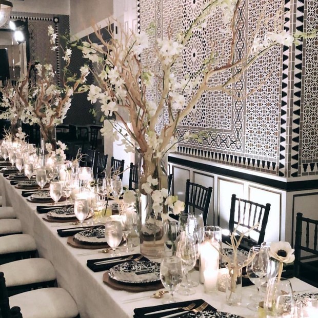 Elegant wedding table setting with white floral decor