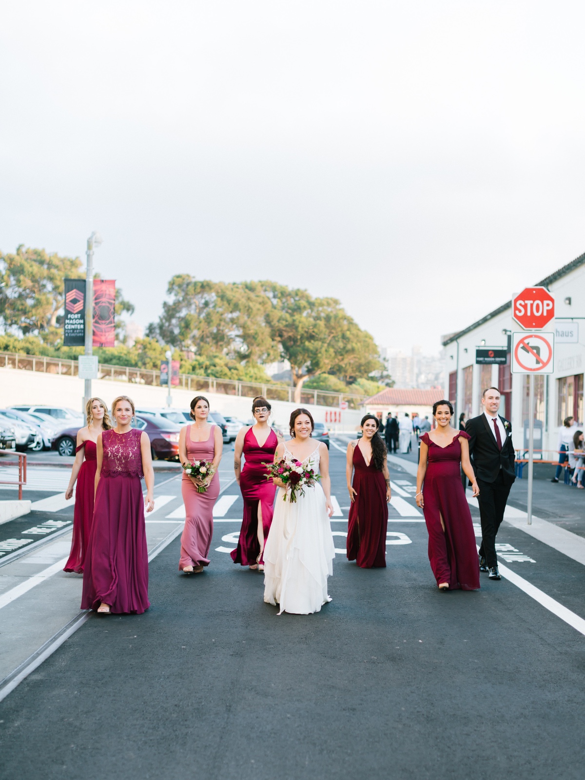 Bridesmaids in pink and burgundy