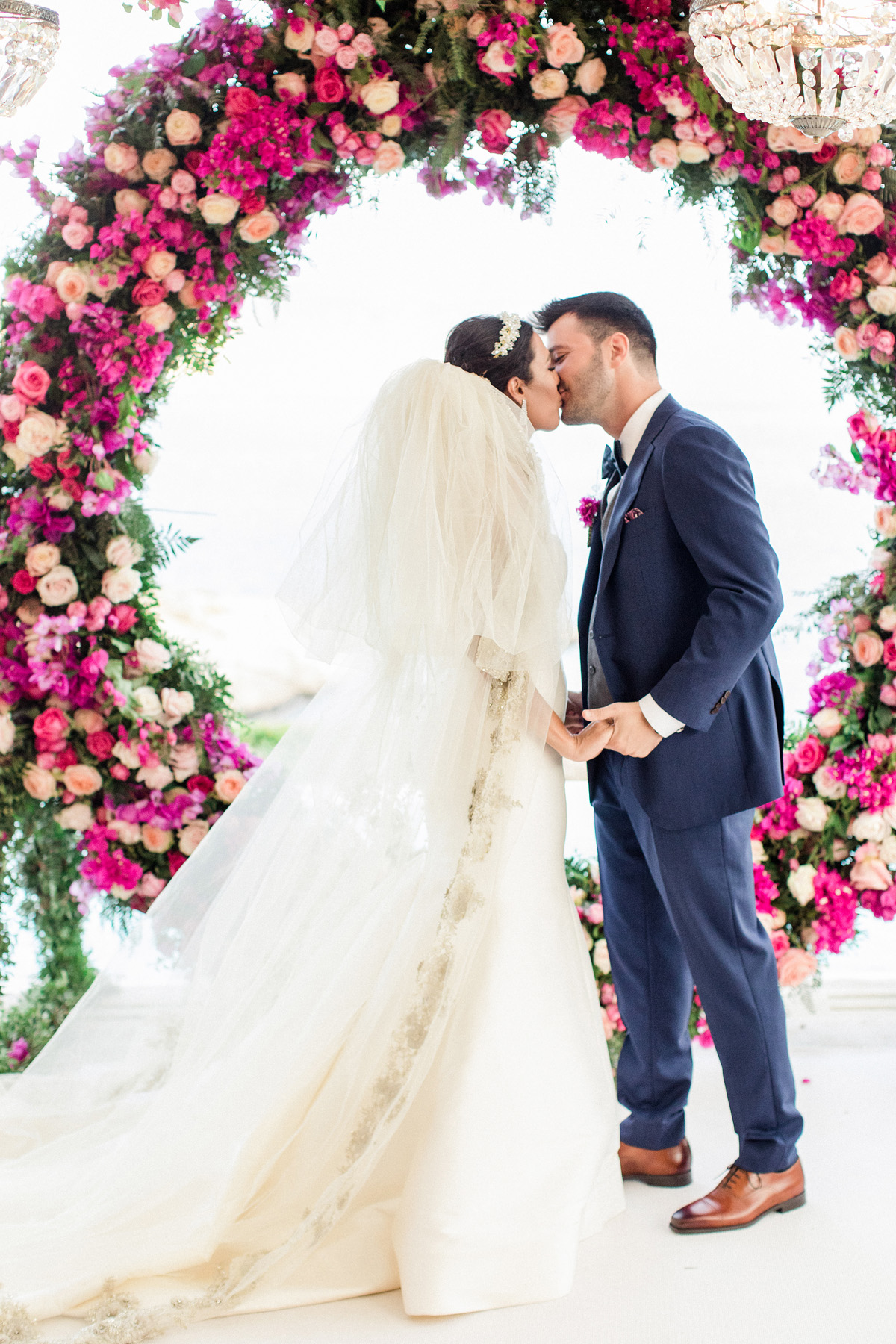 wedding kiss and pink giant wreath backdrop