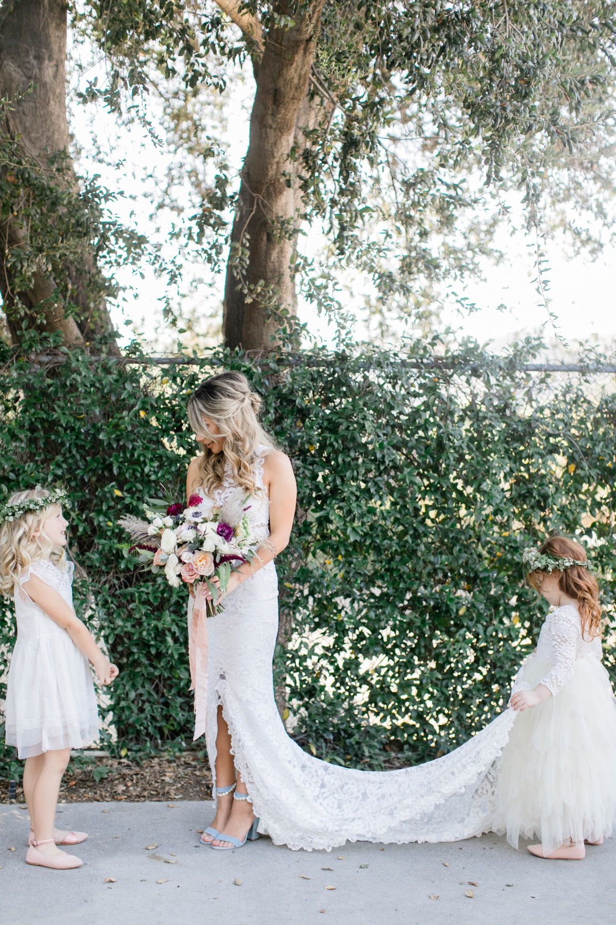 A bride and her flower girls