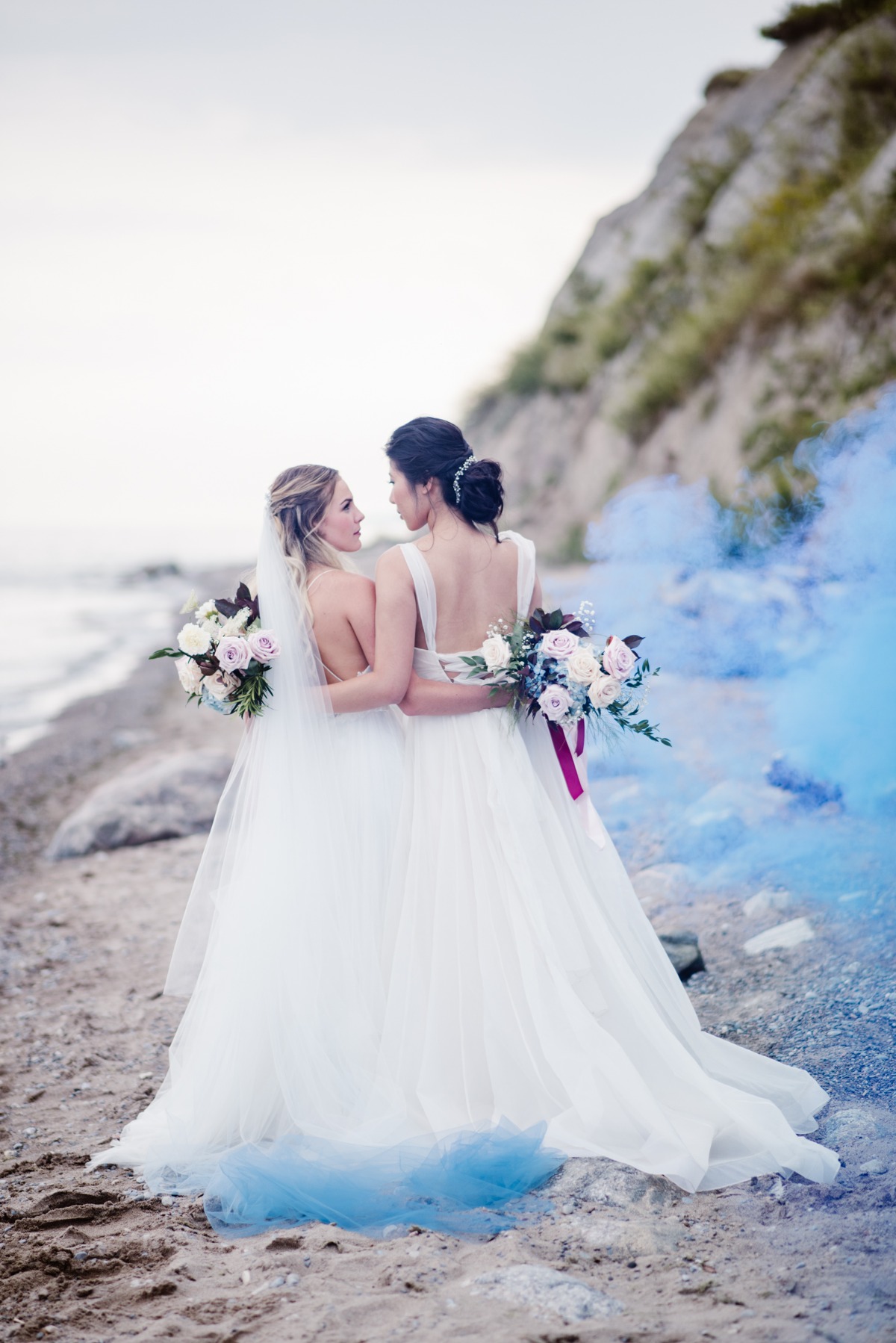 Blue smoke bomb beach wedding photo