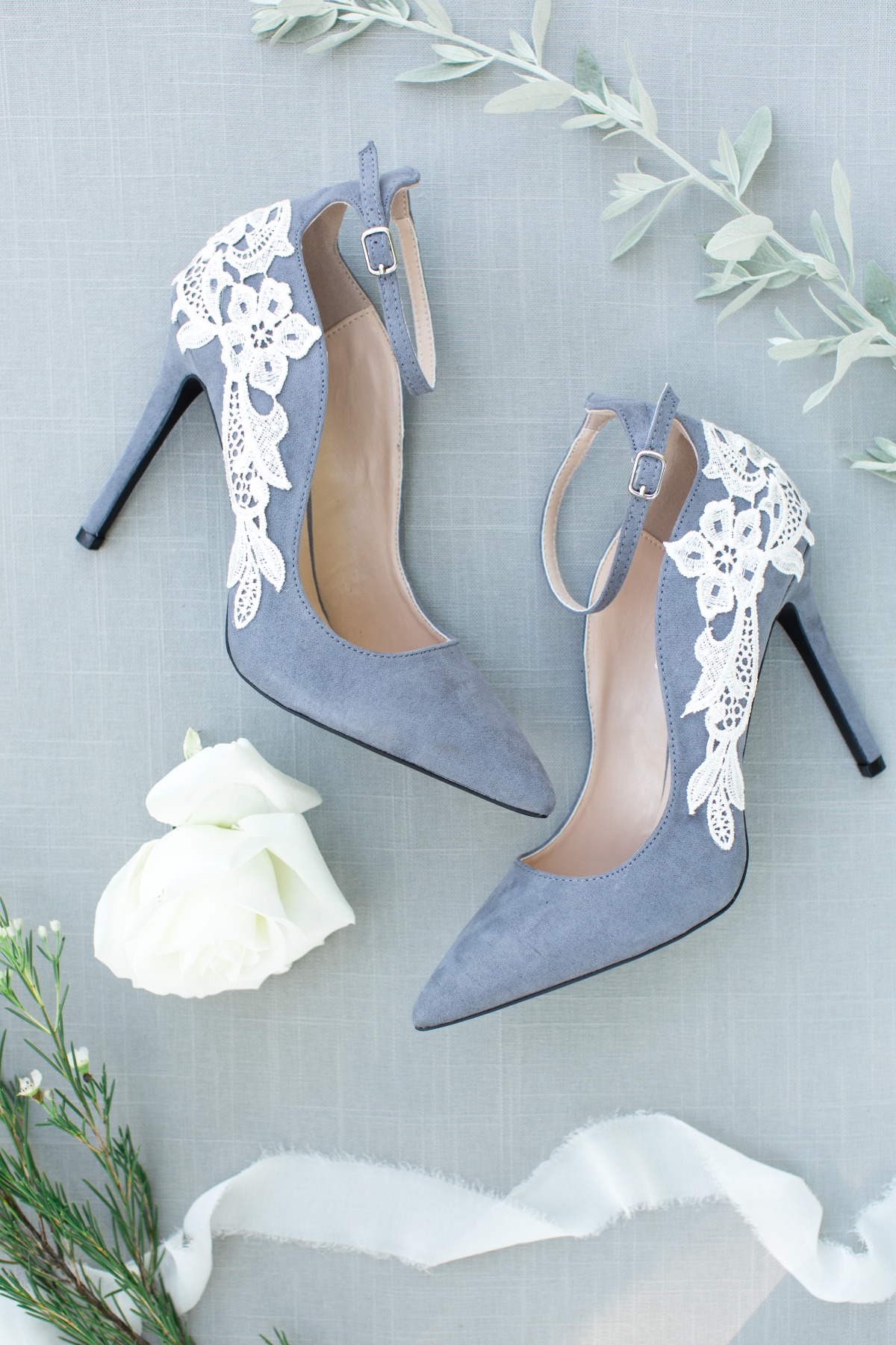 Elegant blue heels with delicate white lace details