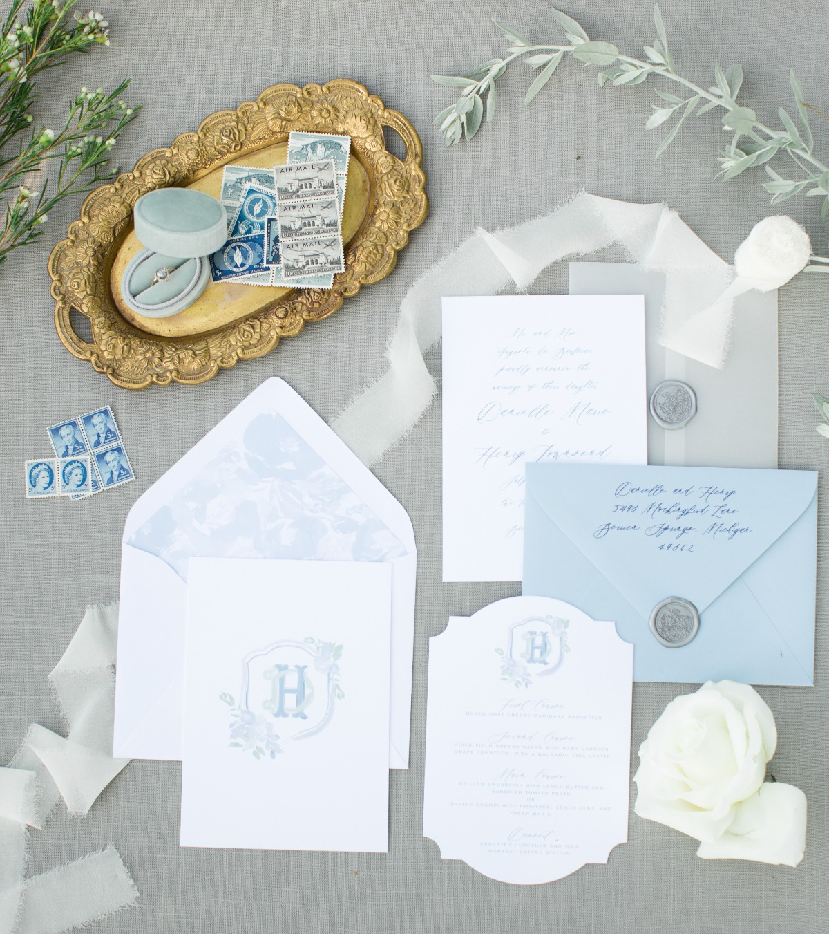 Elegant blue and white wedding invitation suite with details