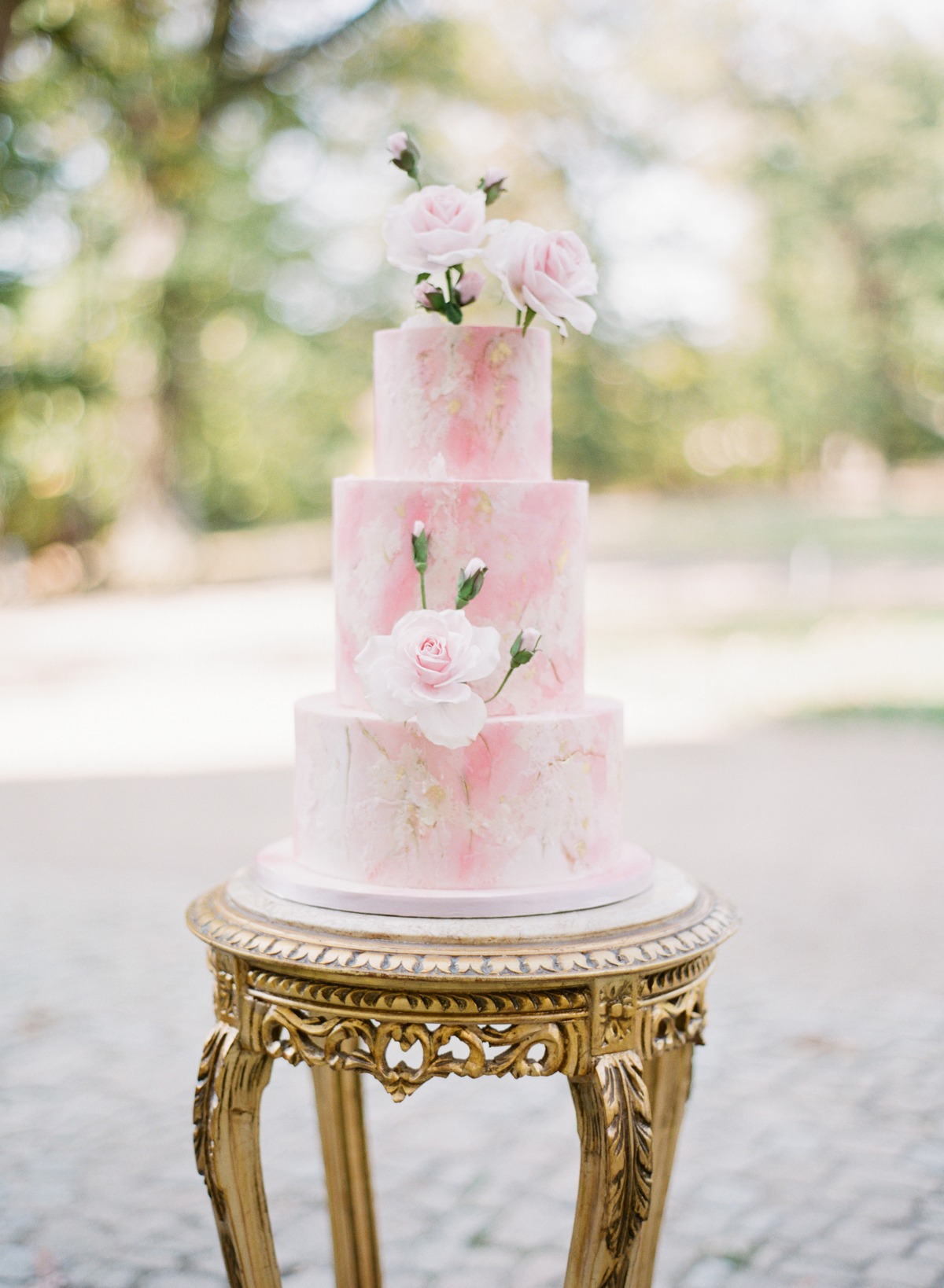 Pink and gold wedding cake