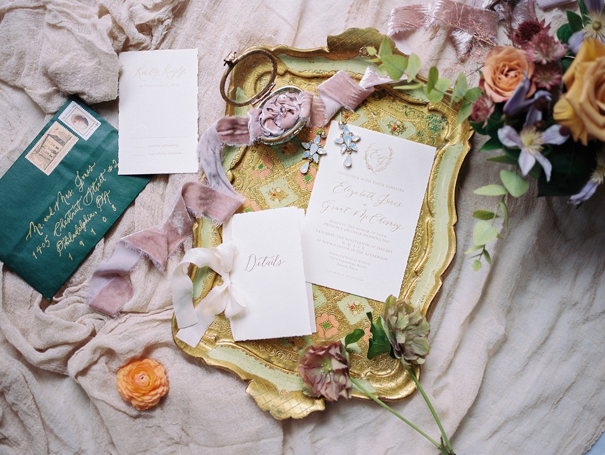 Elegant wedding invitation suite with floral accents