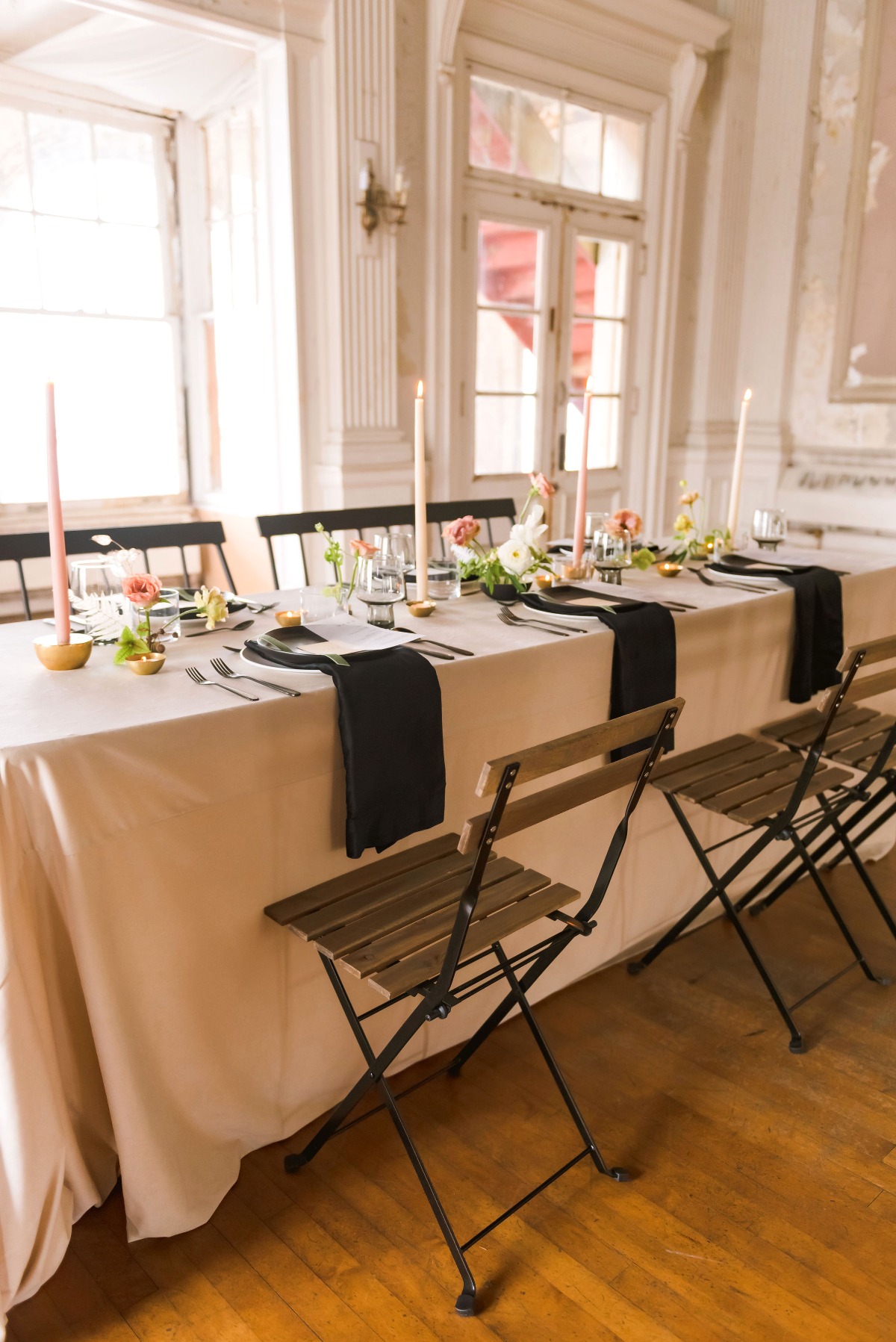 a minimalist blush and black wedding table decor