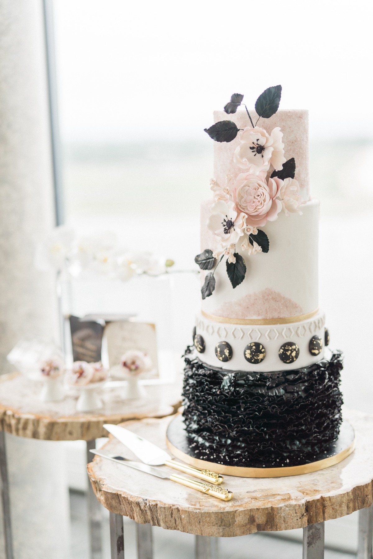 modern wedding cake in matte black and blush