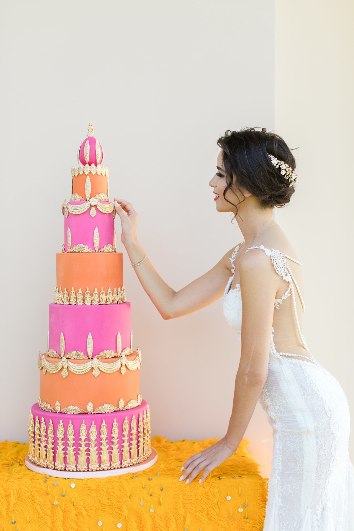 pink orange and gold wedding cake idea