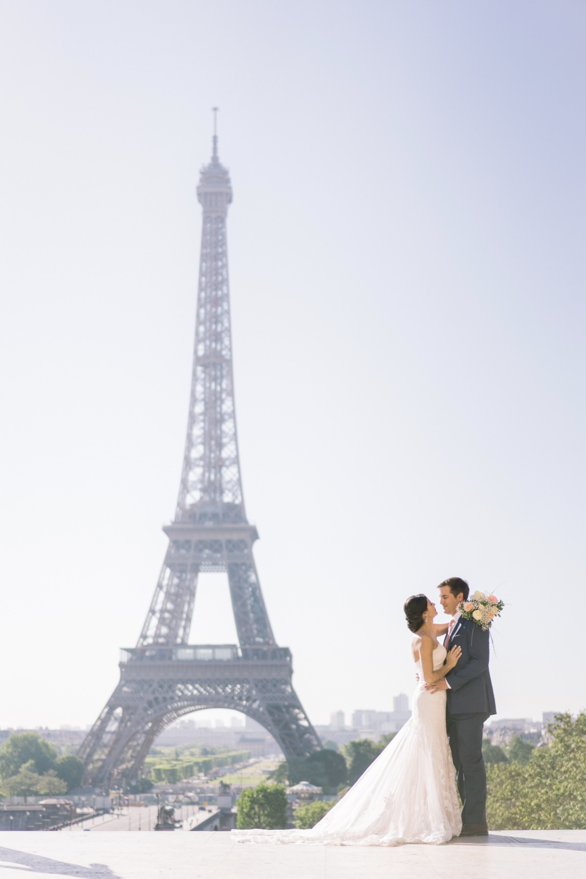 Bride and groom wedding portrait Paris Eiffel Tower