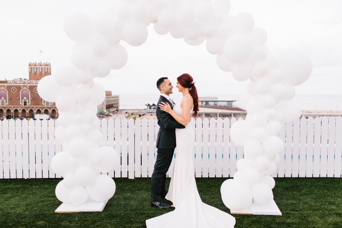 white balloon wedding arch