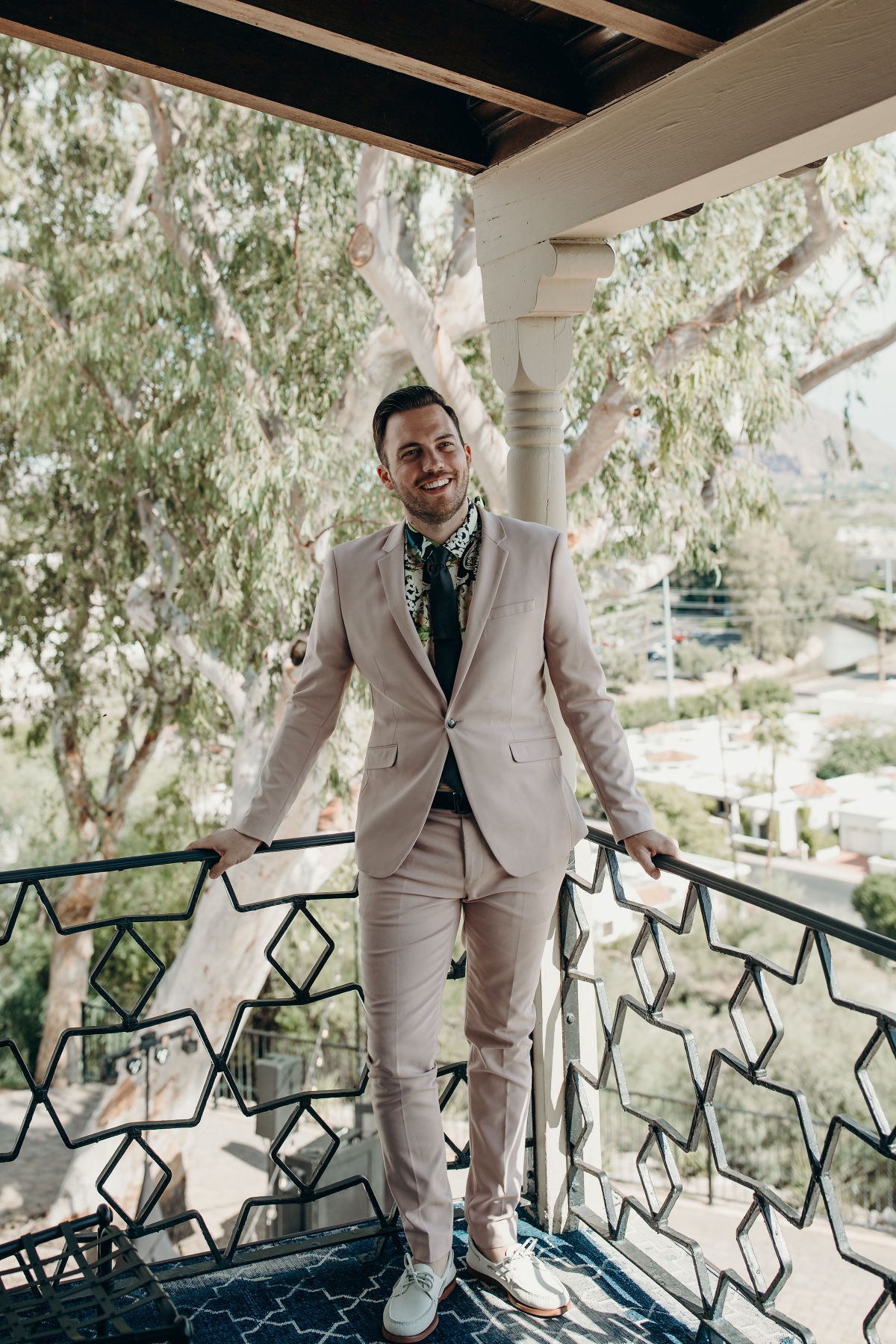 Pale blush suit for the groom