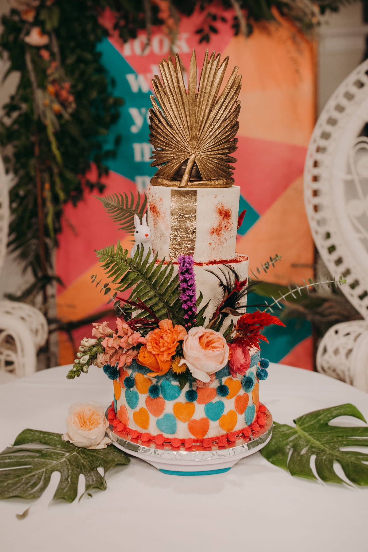 Eclectic Alice in Wonderland inspired wedding cake design