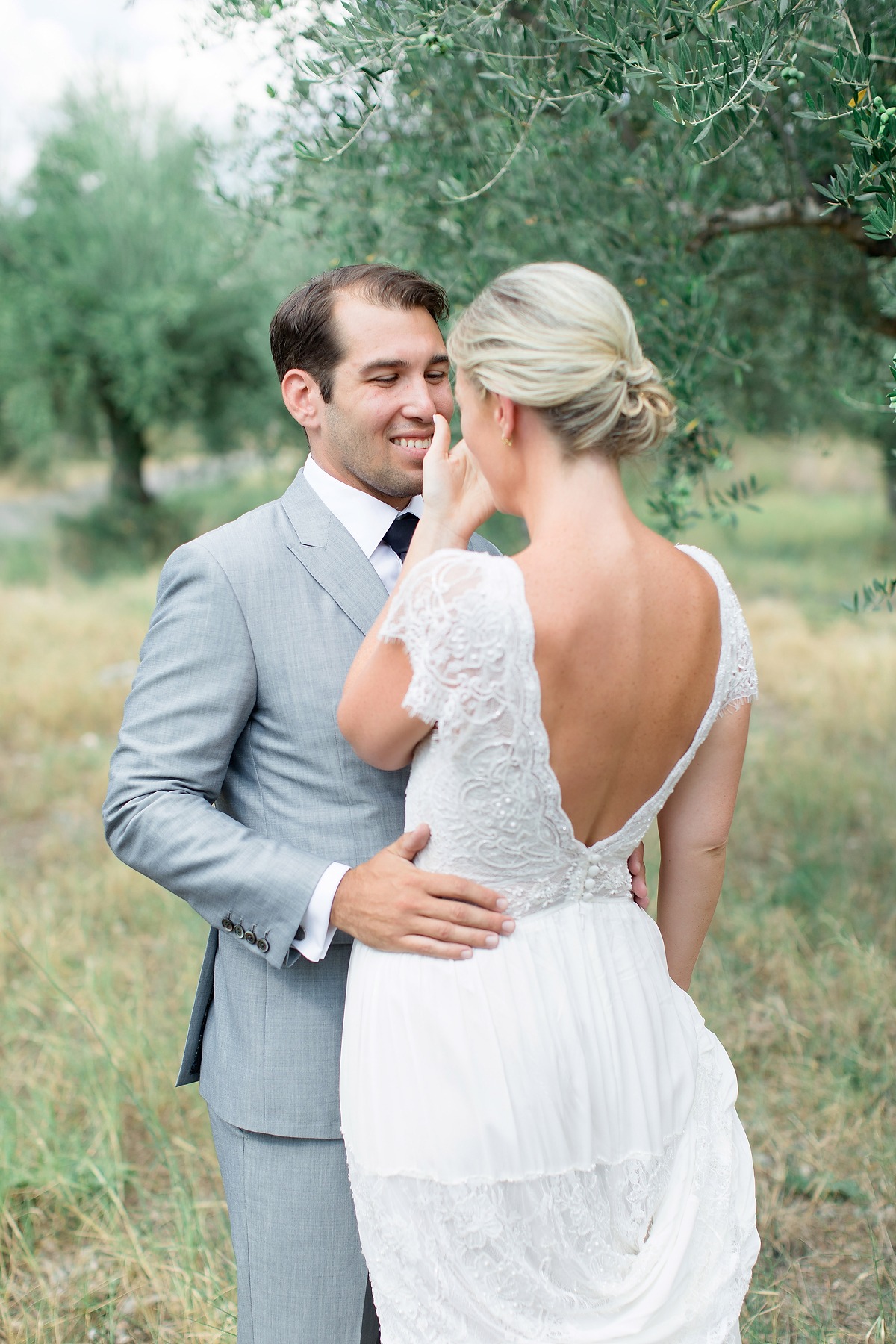 Bride and groom embracing during their wedding day