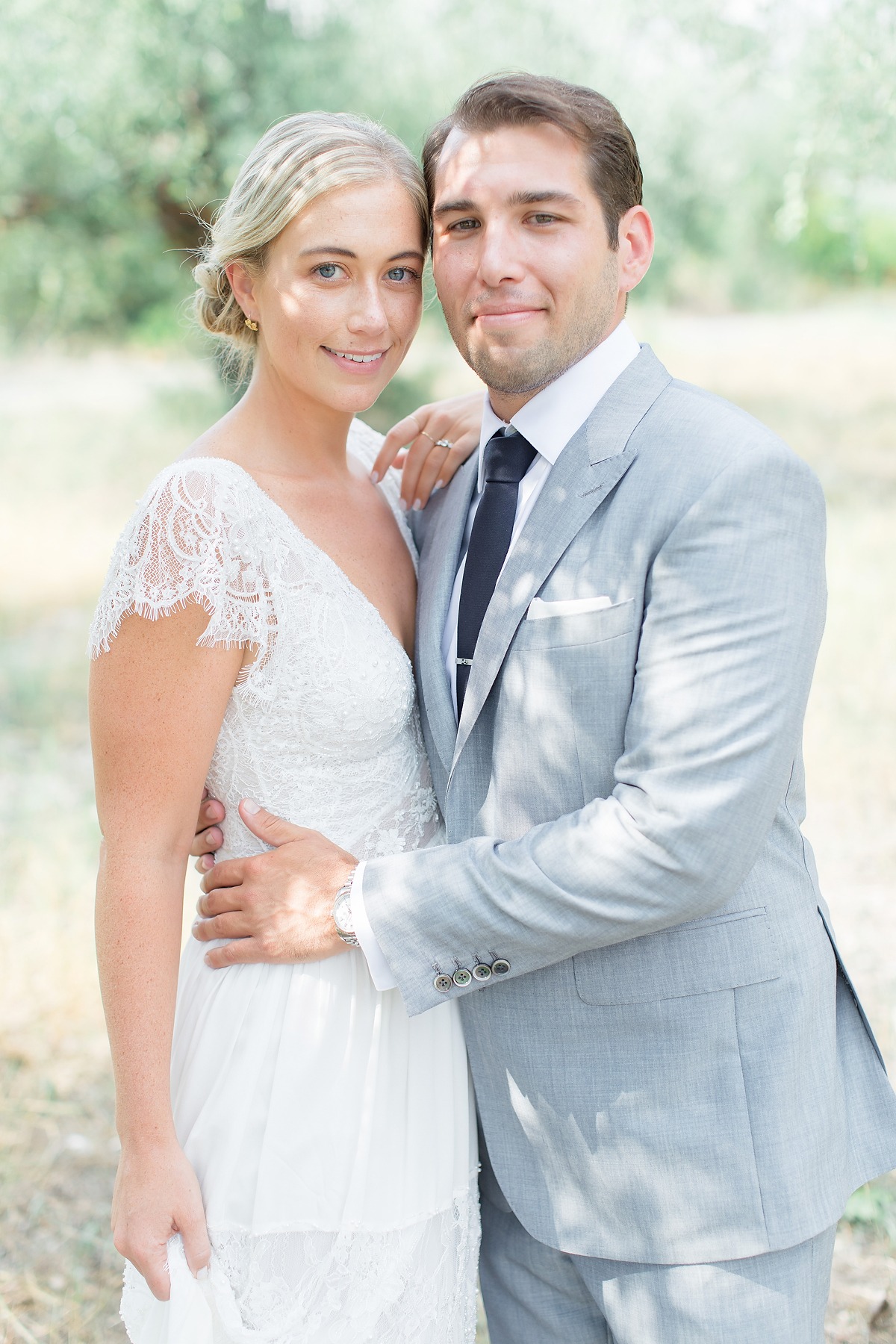Happy bride and groom on their wedding day outdoors