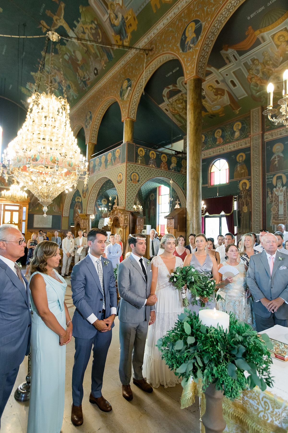 Greek Orthodox wedding ceremony in decorated church