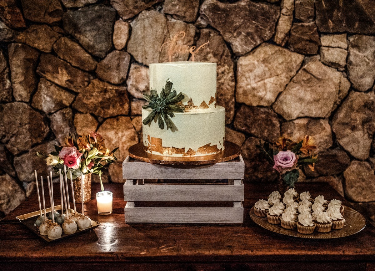 gold leaf and white wedding cake