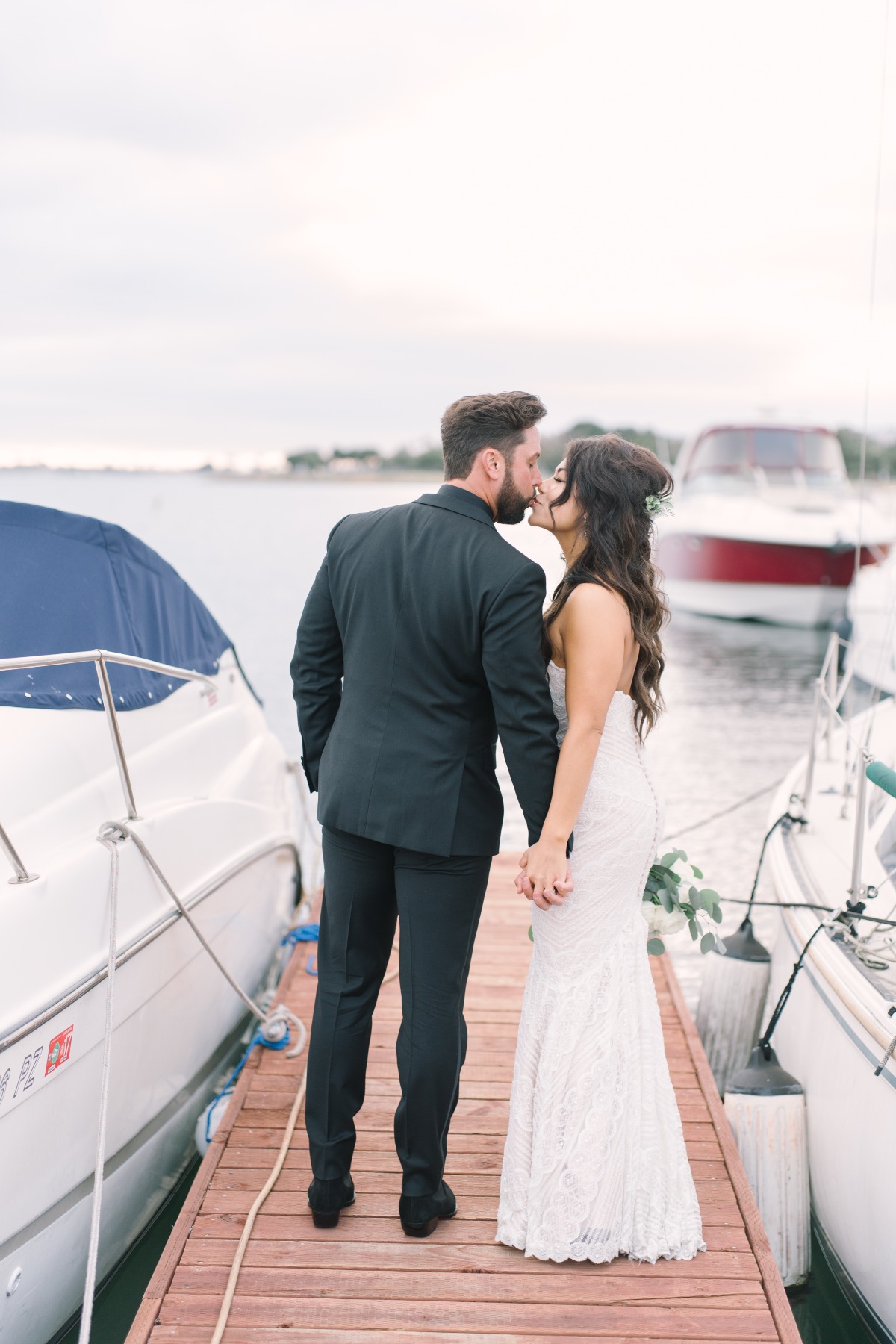 wedding kiss by the bay