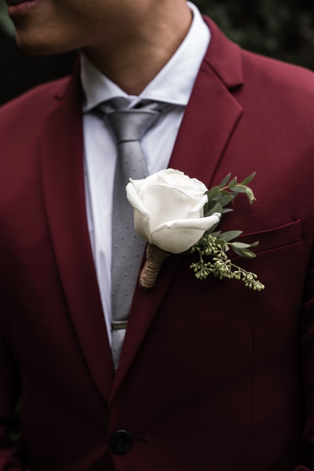 groom in a red