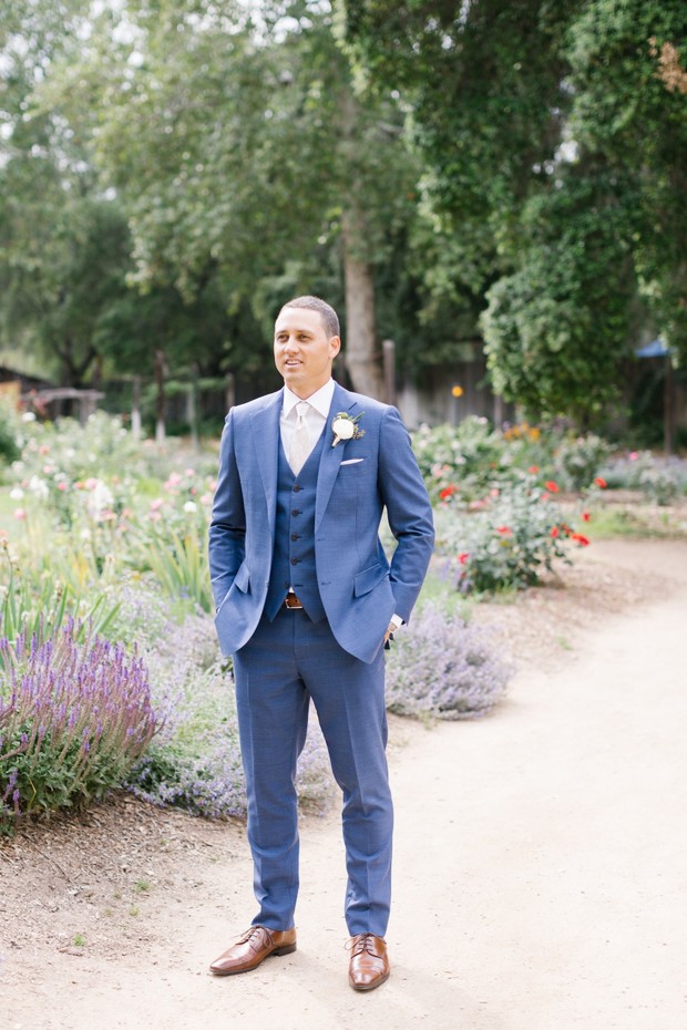 groom in blue three piece suit