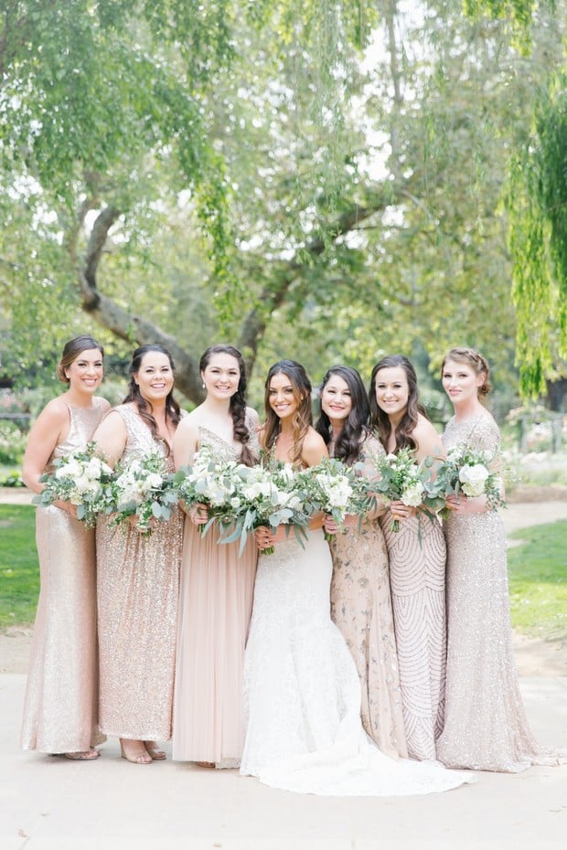 bridesmaids in mismatched blush dresses